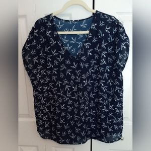 Navy and white misses top